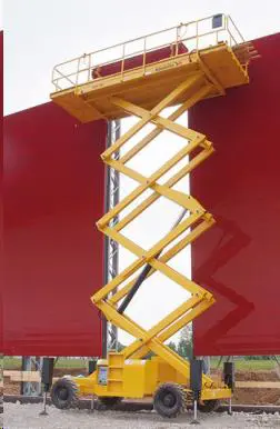 Large platform rough-terrain scissor lift (diesel, 4 WD), 15m