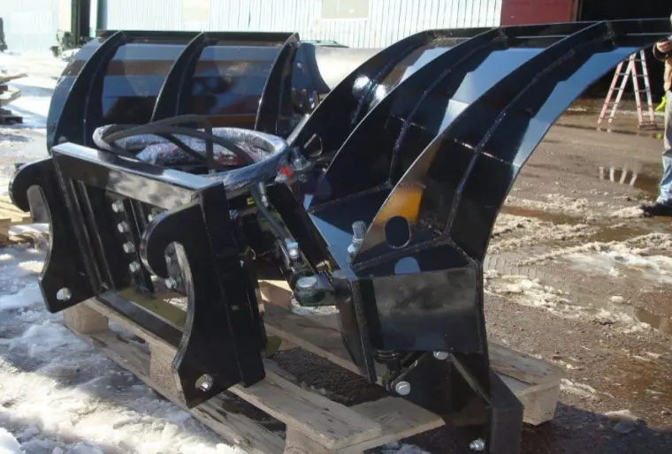 Snow blades for backhoe loaders